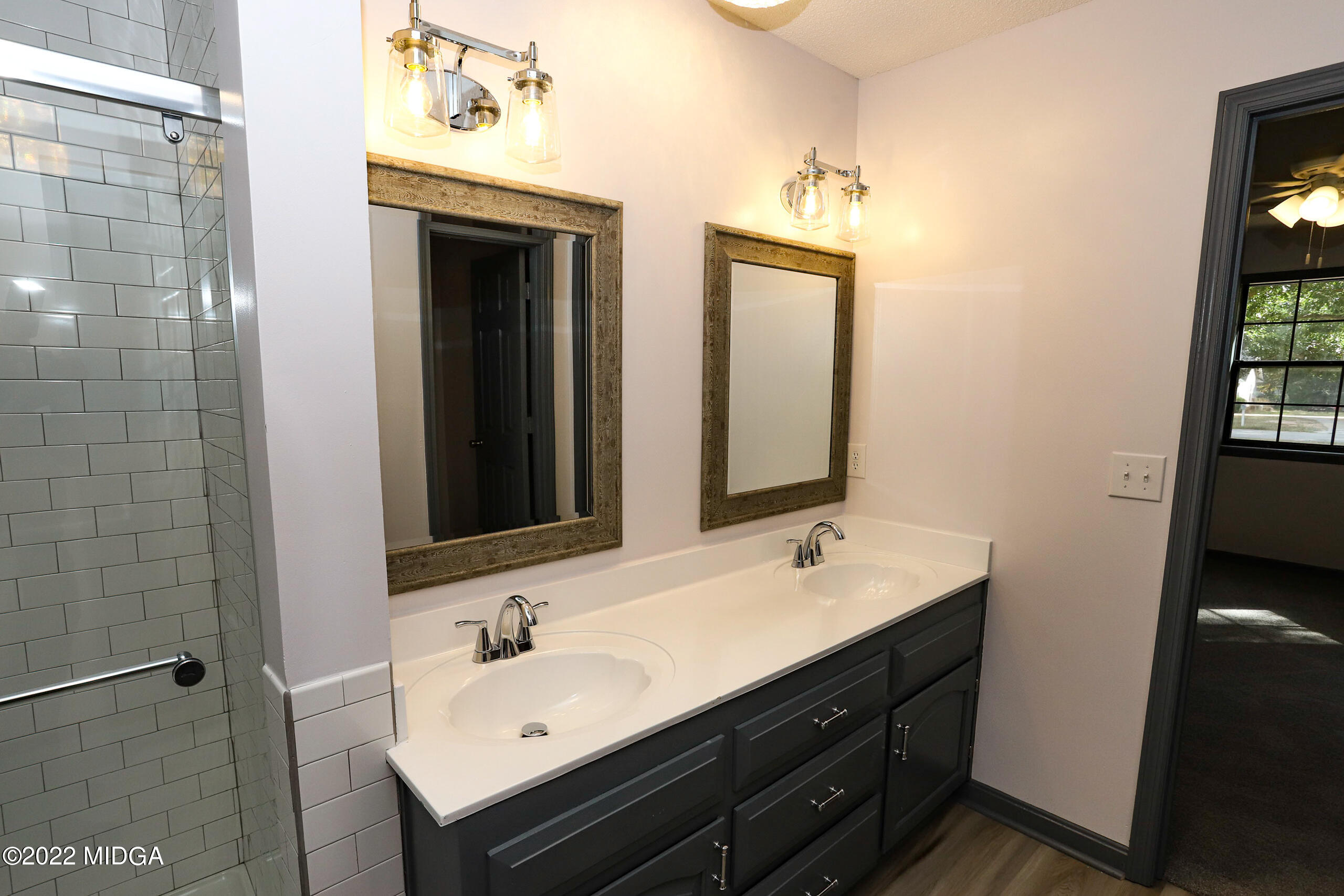 107 Ridge Circle Macon, GA 31216 - Photo 73 of 80 a bathroom with a sink and a mirror