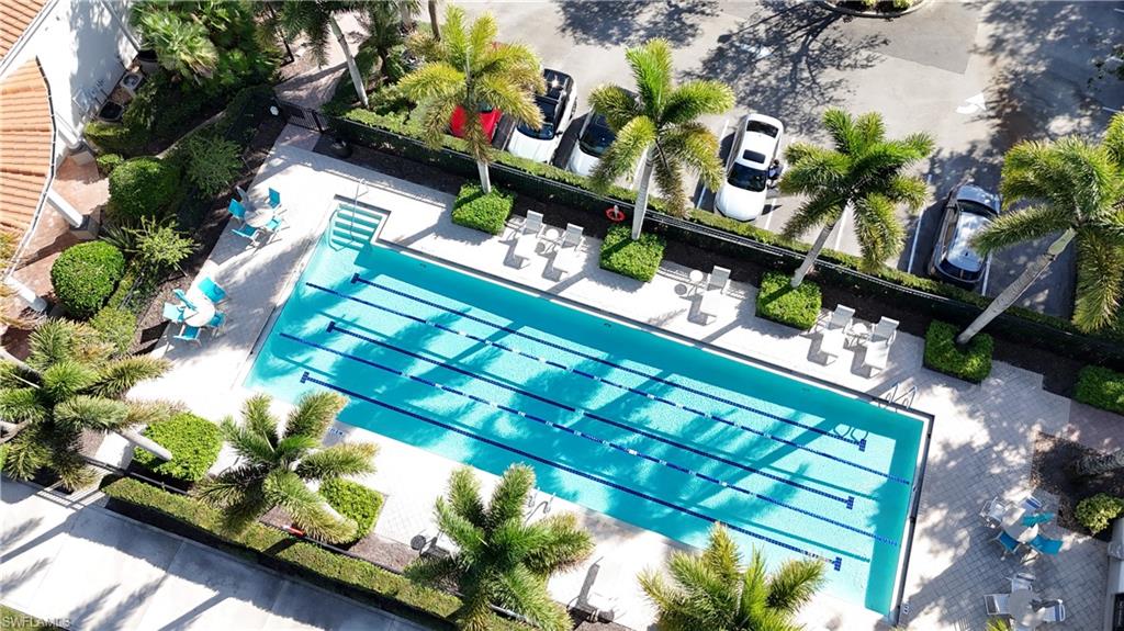 4910 Kingston Way Naples, FL 34119 - Photo 23 of 24 Drone / aerial view of a pool area
