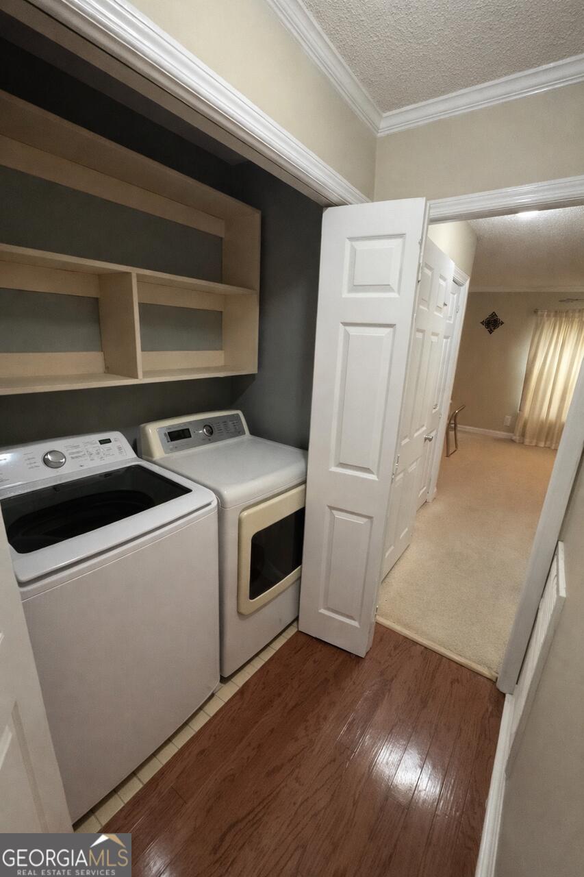 113 Manor Row Macon, GA 31210 - Photo 17 of 19 a utility room with dryer and washer