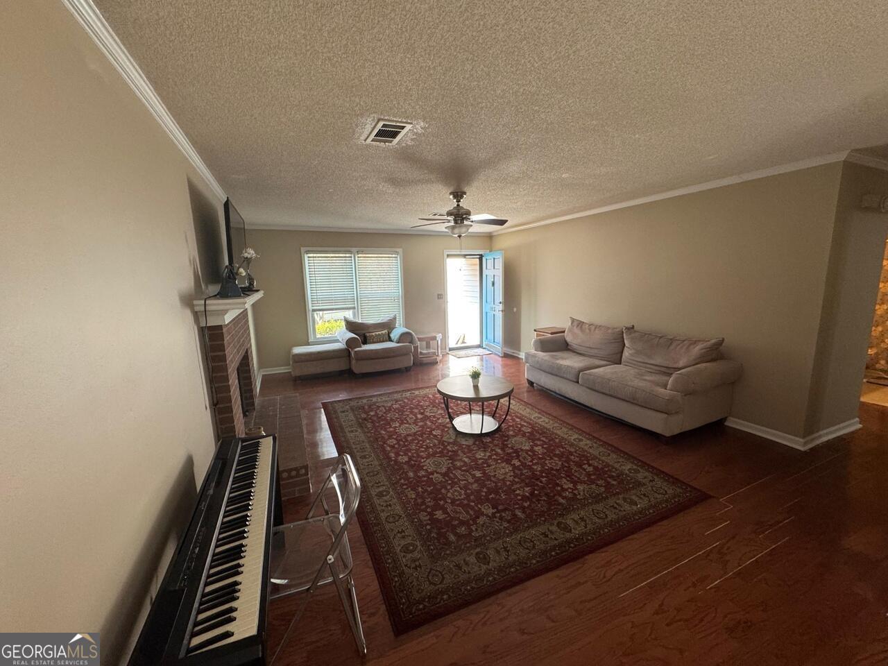113 Manor Row Macon, GA 31210 - Photo 3 of 19 a living room with furniture and a rug