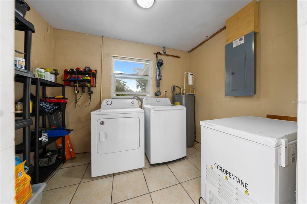 4023 Northeast 7th Street Ocala, FL 34470 - Photo 27 of 32 a utility room with dryer and washer