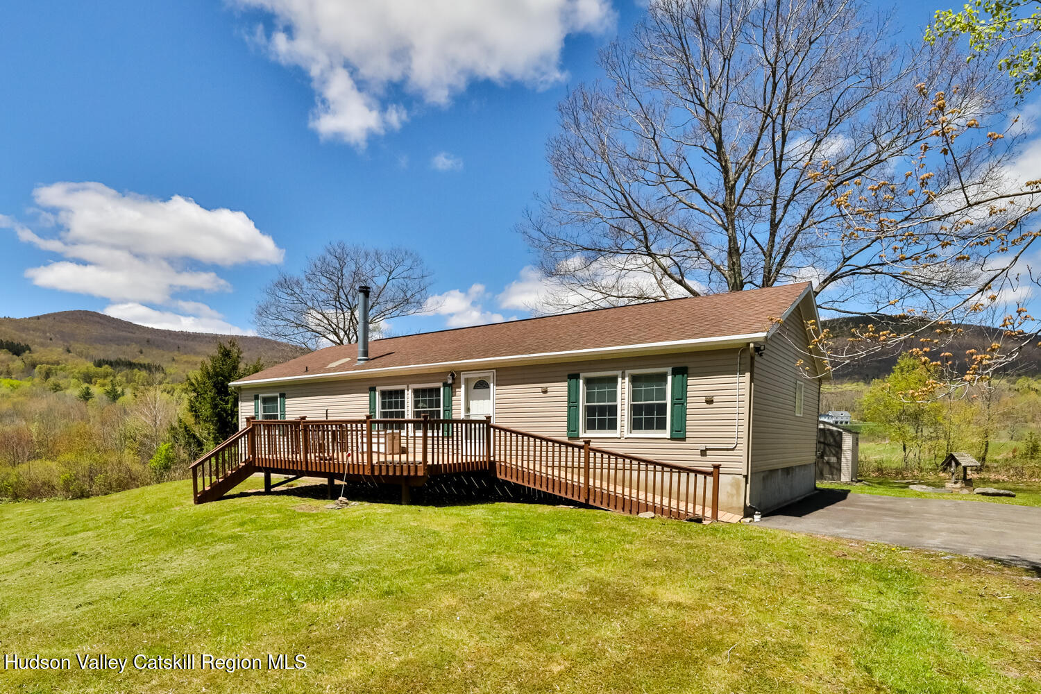 751 Mitchell Hollow Road Windham, NY 12496 - Photo 2 of 37 a view of a house with a big yard