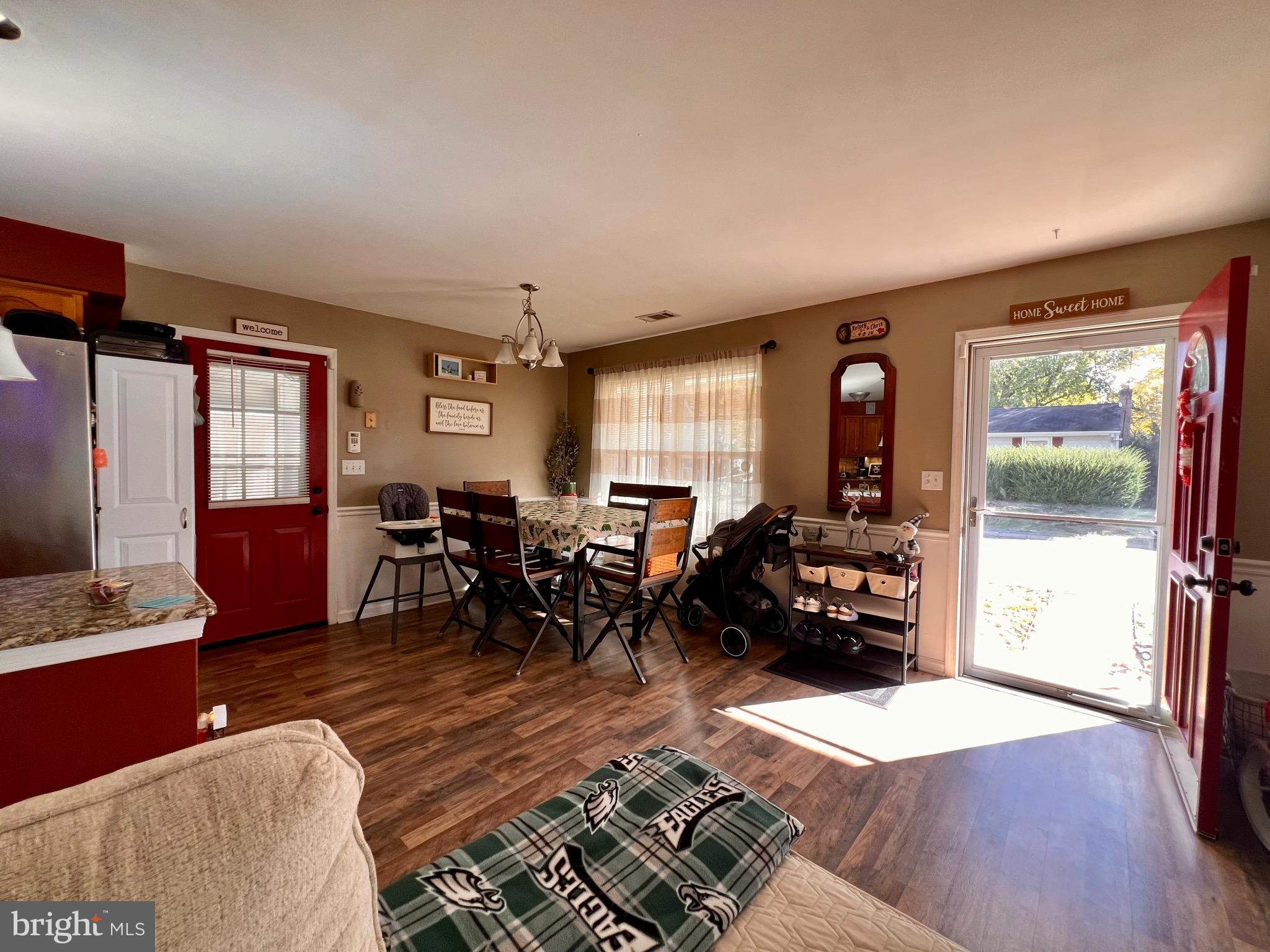111 Anderson Street Middletown, DE 19709 - Photo 13 of 48 a living room with furniture and wooden floor