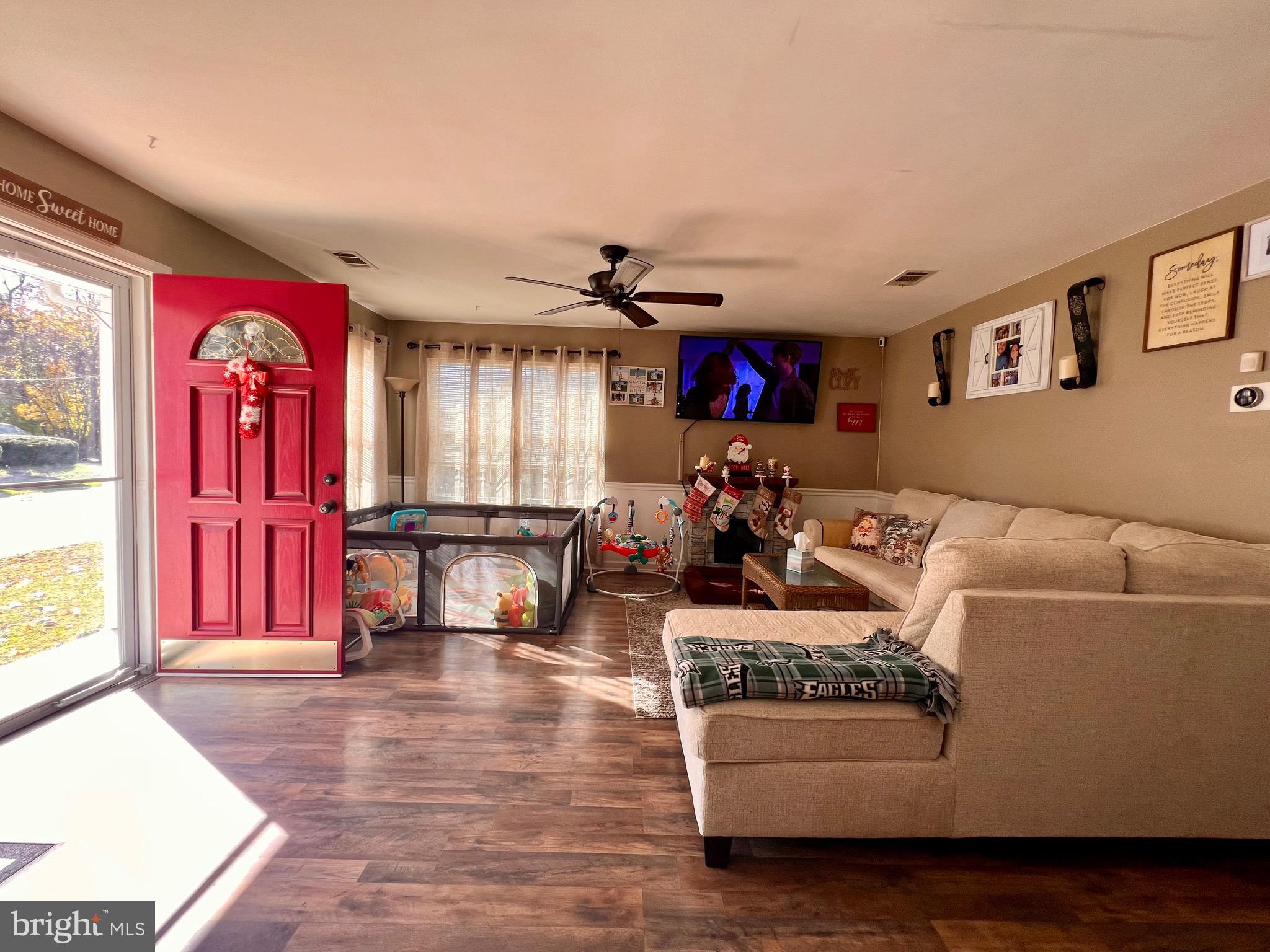 111 Anderson Street Middletown, DE 19709 - Photo 15 of 48 a living room with furniture and a flat screen tv
