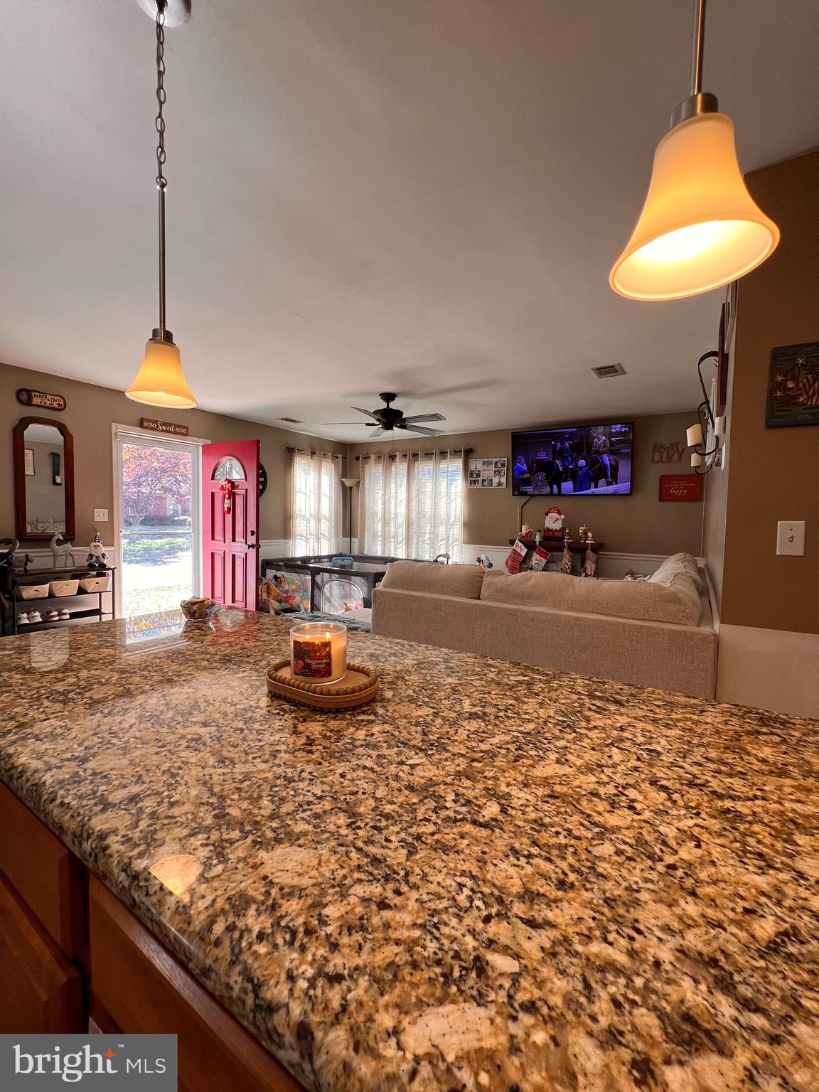 111 Anderson Street Middletown, DE 19709 - Photo 21 of 48 a kitchen area with granite countertop a sink and a stove