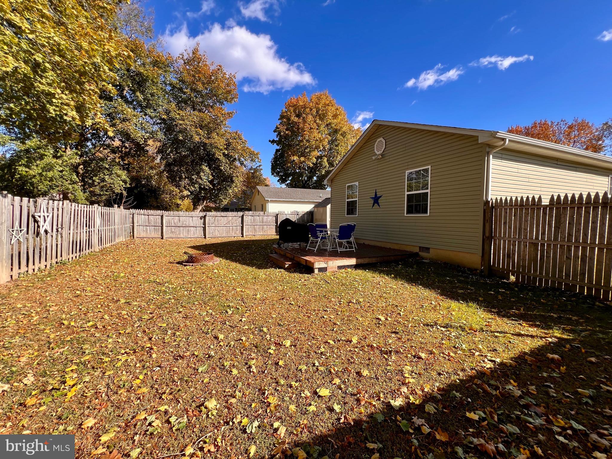111 Anderson Street Middletown, DE 19709 - Photo 45 of 48 a backyard of a house with table and chairs