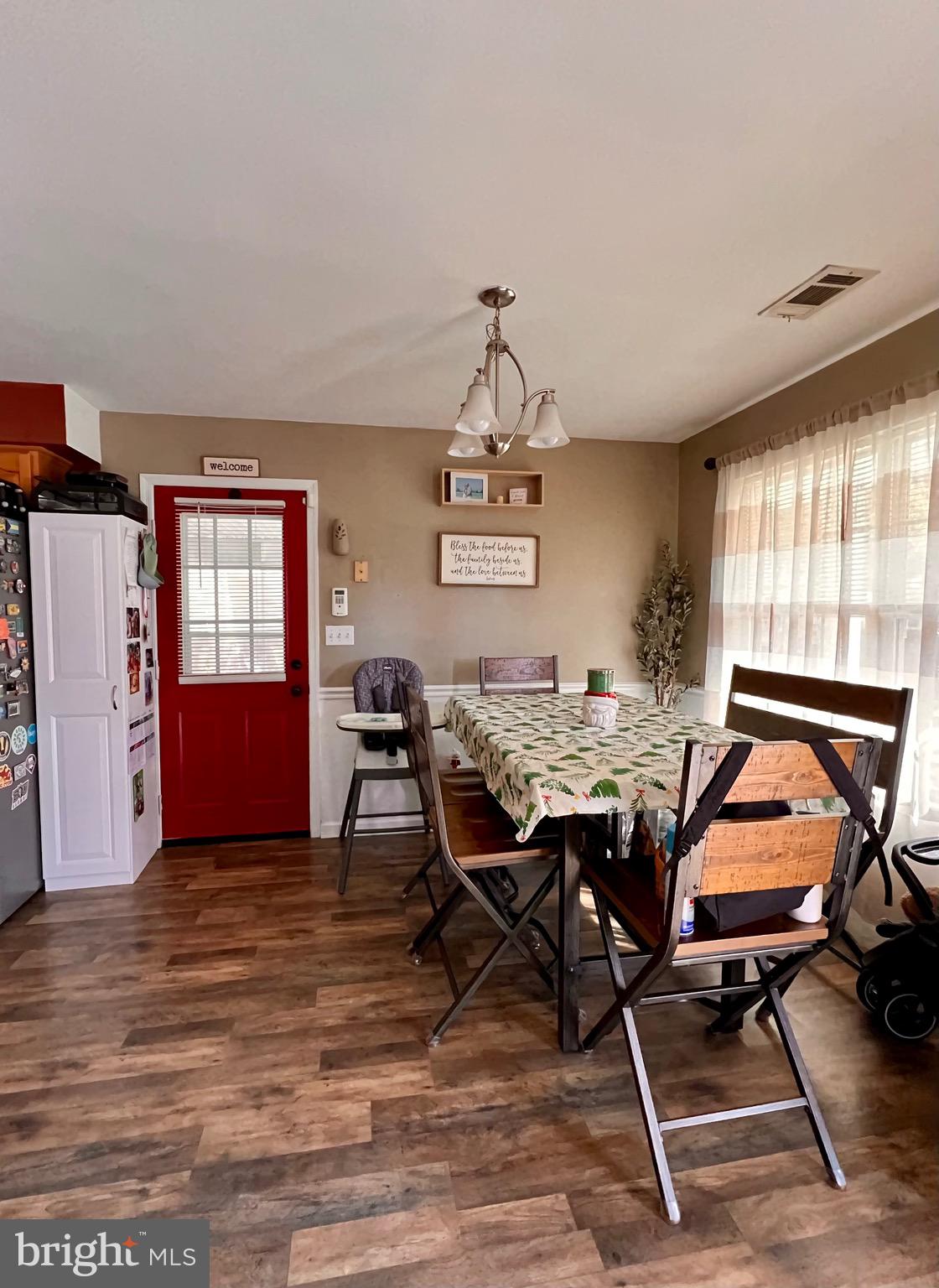 111 Anderson Street Middletown, DE 19709 - Photo 8 of 48 a view of a dining room with furniture window and wooden floor