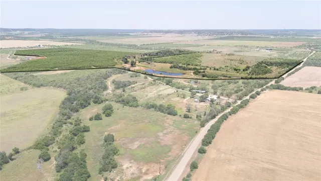a view of an ocean and a mountain