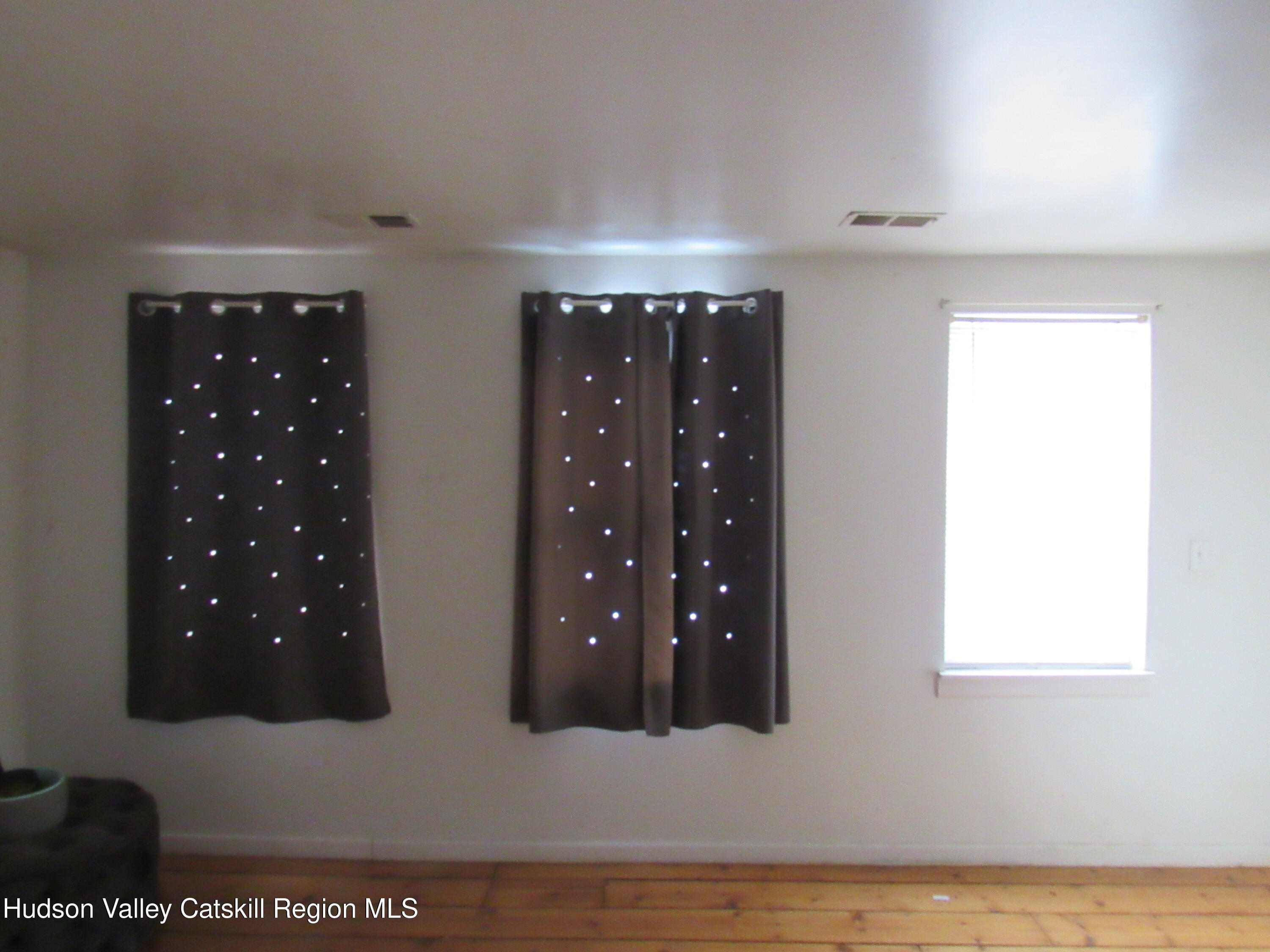 19 Old Post Road Esopus, NY 12493 - Photo 16 of 26 a kitchen with stainless steel appliances granite countertop a refrigerator and a wooden cabinets