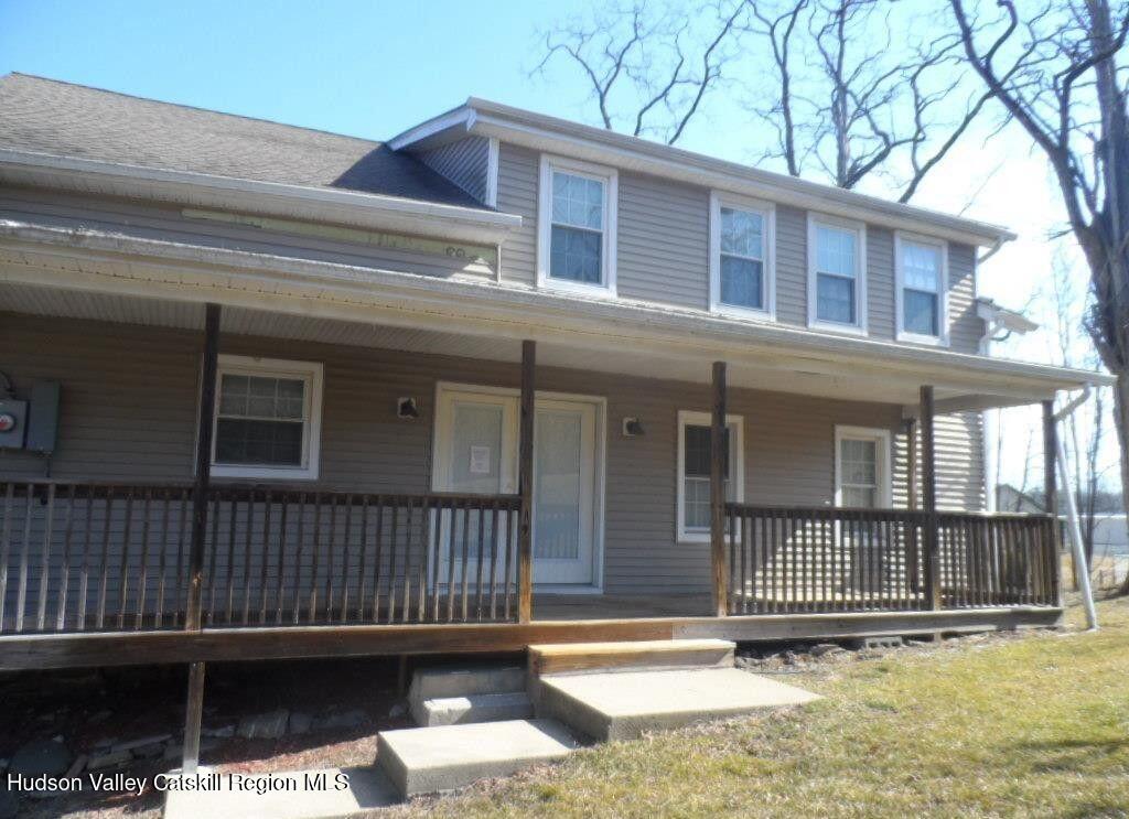 19 Old Post Road Esopus, NY 12493 - Photo 2 of 26 a front view of a house with a porch