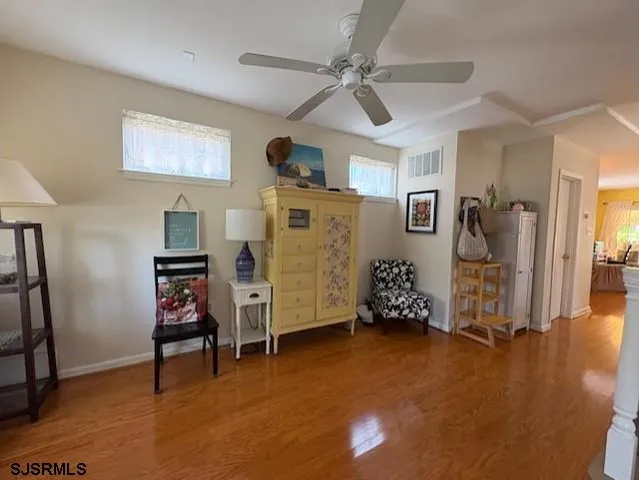 a view of a livingroom with furniture and a livingroom