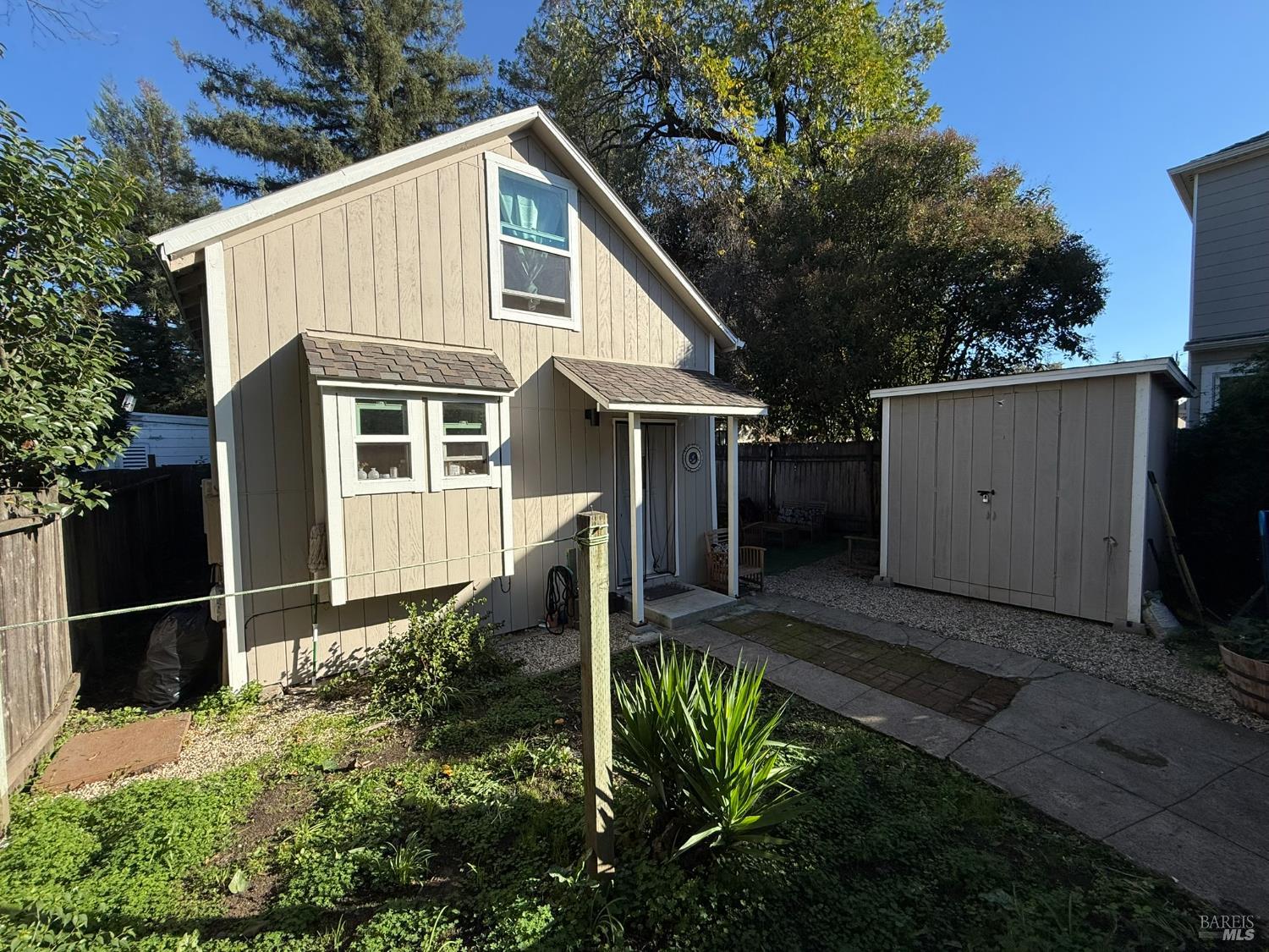 930 Morgan Street, Unit 3 Santa Rosa, CA 95401 - Photo 20 of 53 a backyard of a house with lots of green space