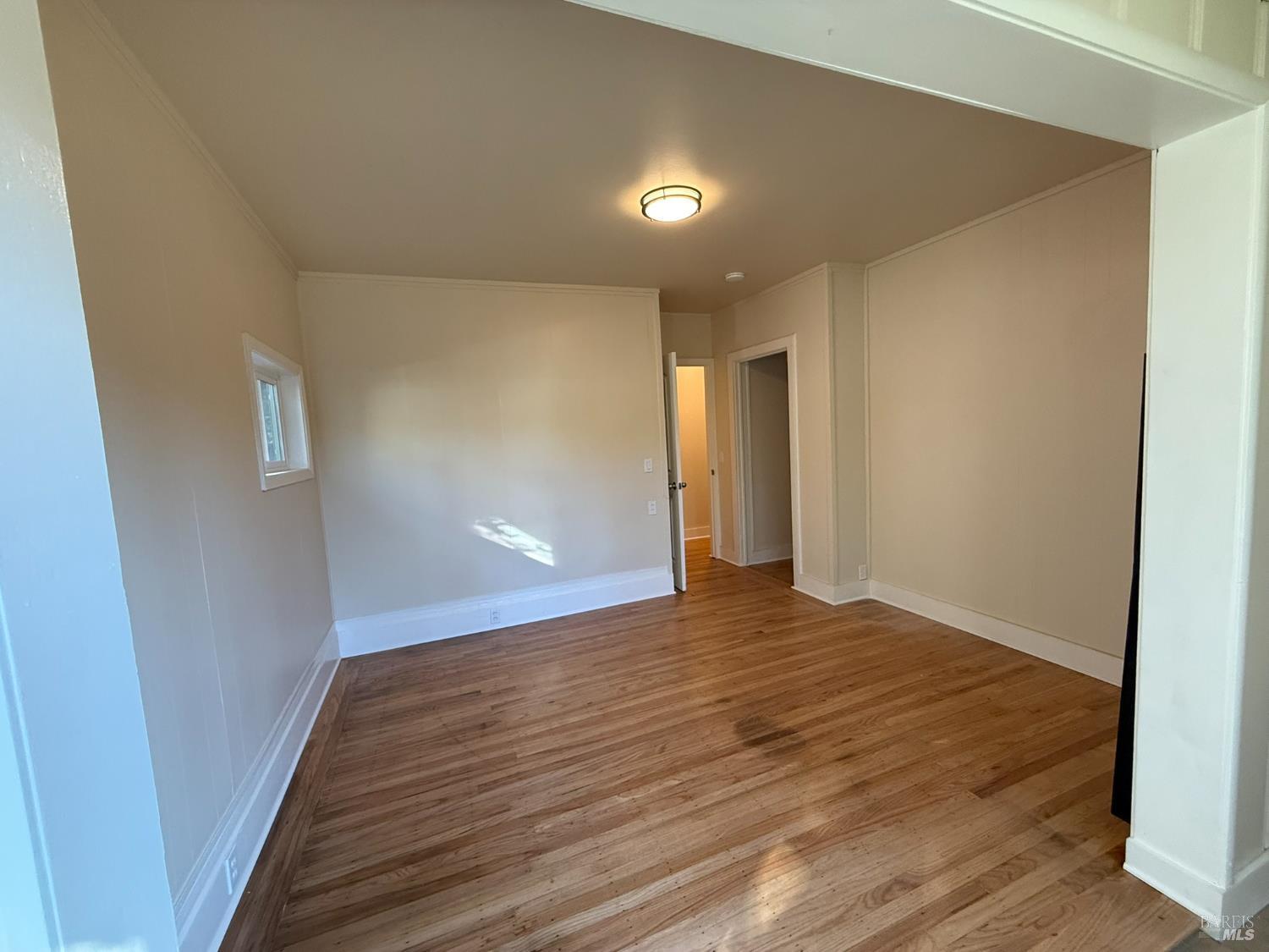 930 Morgan Street, Unit 3 Santa Rosa, CA 95401 - Photo 2 of 53 a view of an empty room with wooden floor