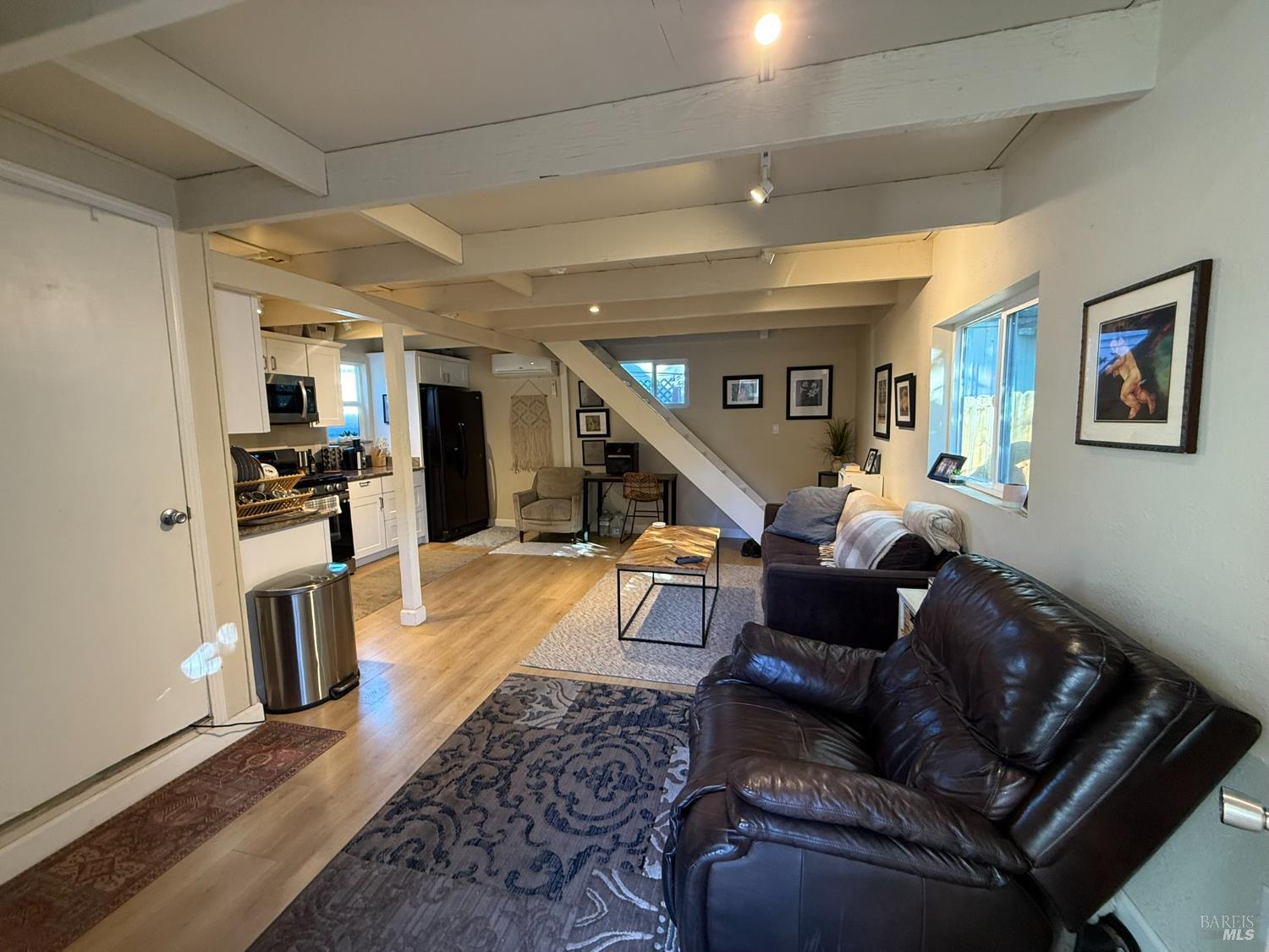 930 Morgan Street, Unit 3 Santa Rosa, CA 95401 - Photo 24 of 53 a living room with furniture and a wooden floor