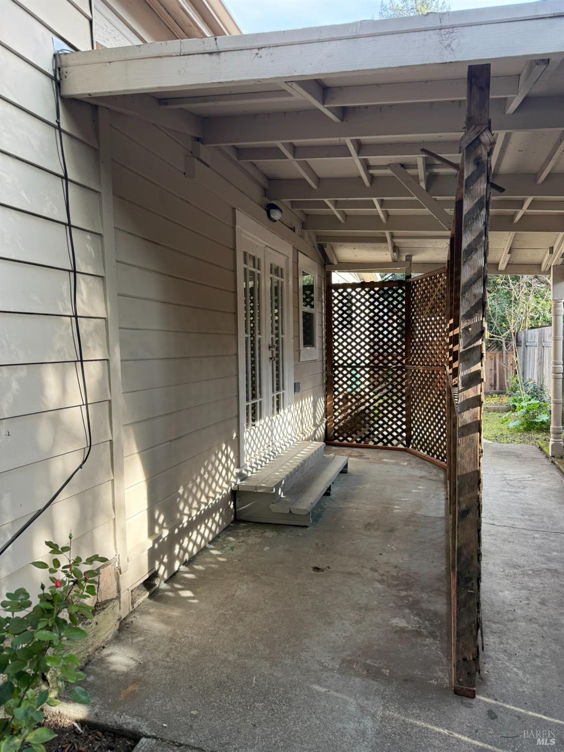 930 Morgan Street, Unit 3 Santa Rosa, CA 95401 - Photo 52 of 53 a backyard of a house with table and chairs