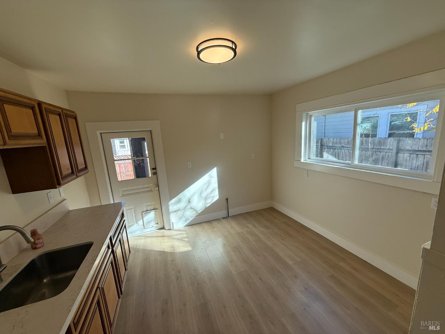 930 Morgan Street, Unit 3 Santa Rosa, CA 95401 - Photo 9 of 53 a view of a livingroom with furniture and staircase