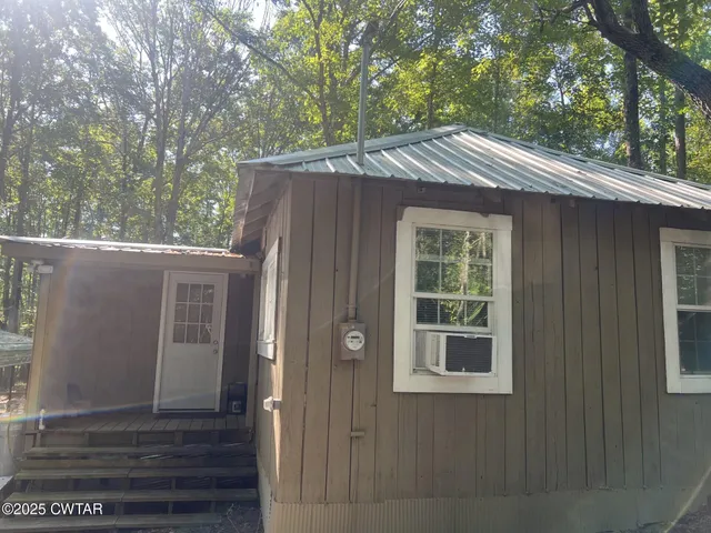a house view with a outdoor space