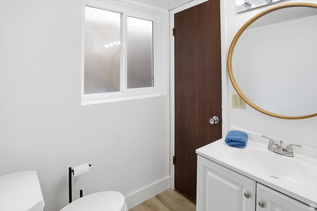 5108 South 2000th Street West Roy, UT 84067 - Photo 42 of 61 Bathroom with vanity and light wood-style floors