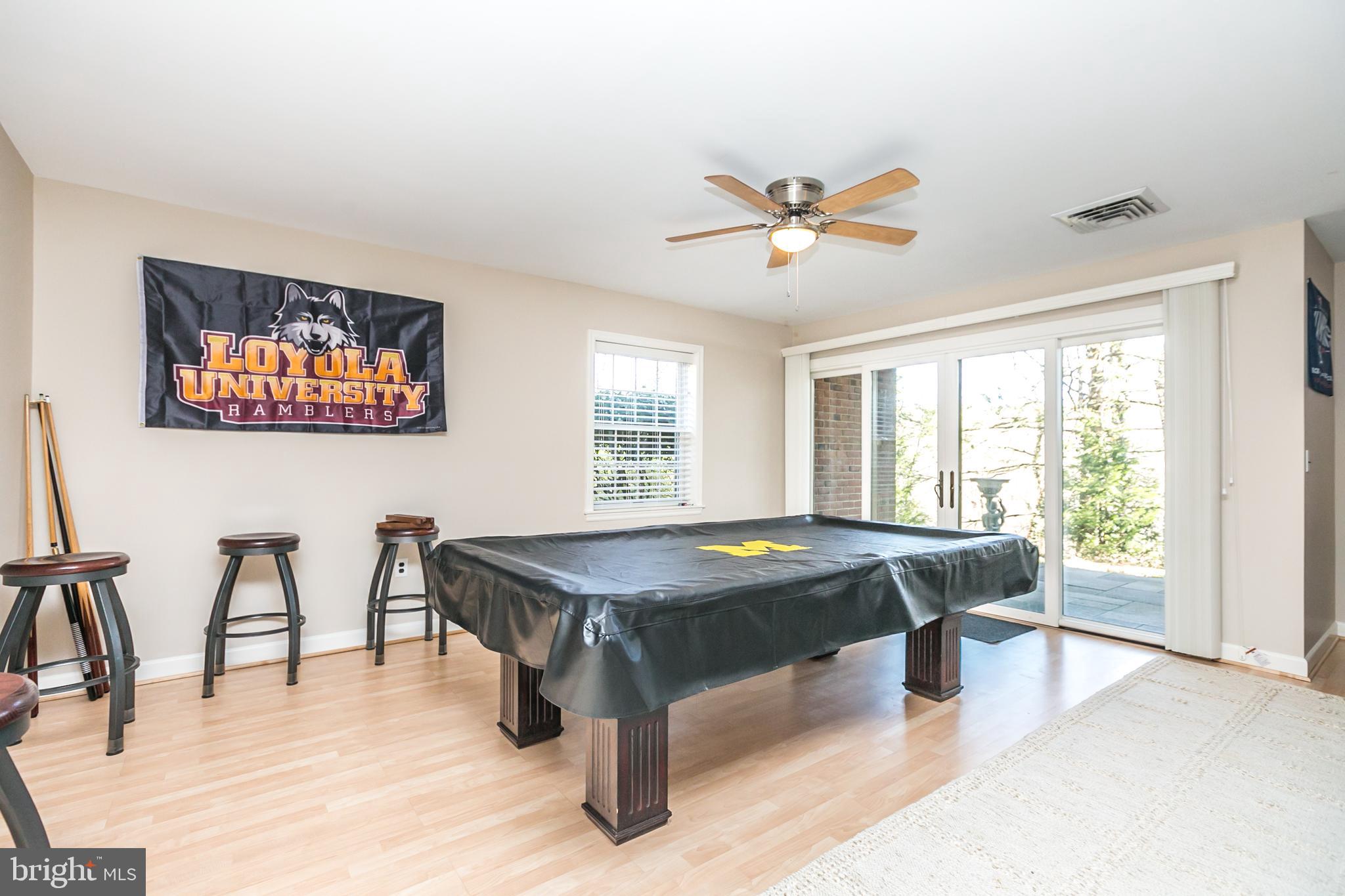 8023 Strauff Road, Unit 8C Towson, MD 21204 - Photo 46 of 50 Family room walk-out level with natural light