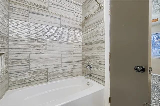 a bathroom with a bathtub