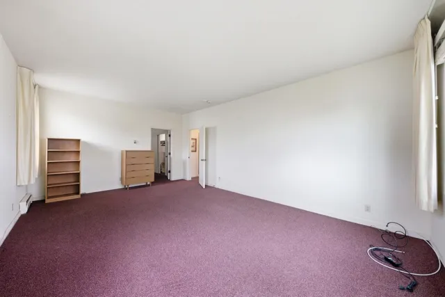 a view of a kitchen with sink and washer