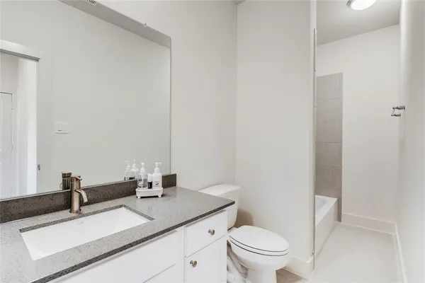 a bathroom with a sink and a toilet