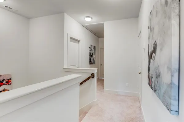 a bathroom with a granite countertop sink a mirror and shower