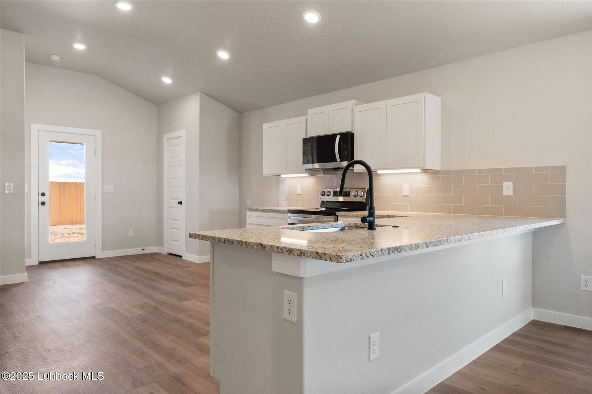 2308 133rd Street Lubbock, TX 79423 - Photo 7 of 17 08-2308 133rd_6724