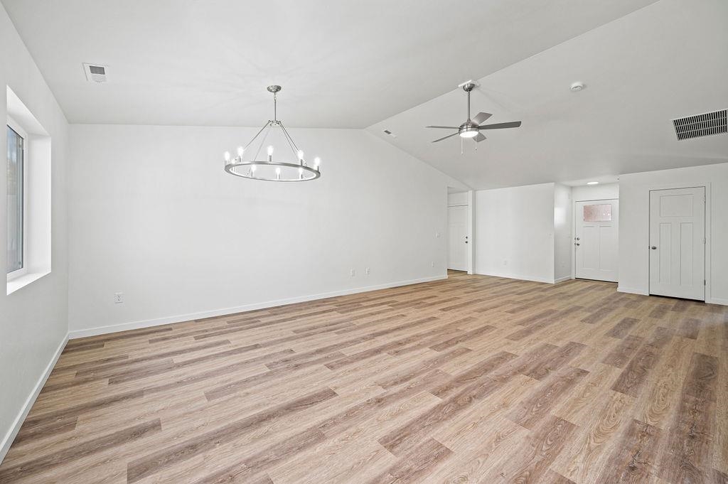 164 Orchard View Way Grand Junction, CO 81503 - Photo 14 of 24 a view of empty room with wooden floor and ceiling fan