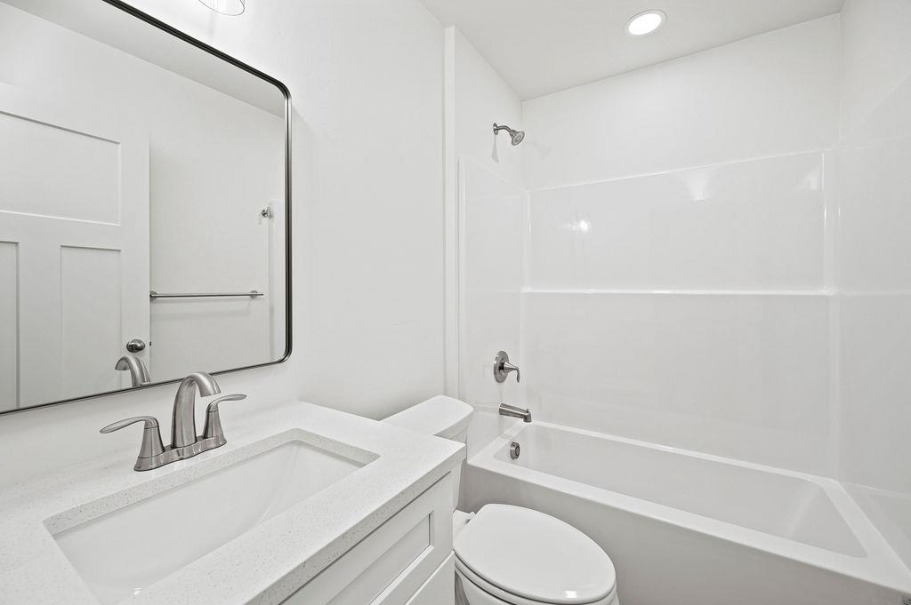 164 Orchard View Way Grand Junction, CO 81503 - Photo 21 of 24 a bathroom with a sink toilet vanity and shower