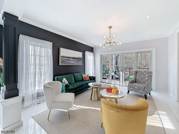 a bedroom with a large bed and a large window
