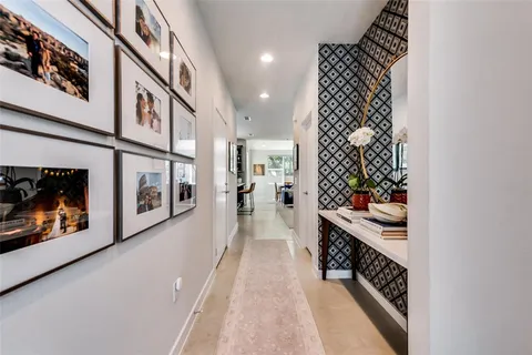 a hallway with a large entryway