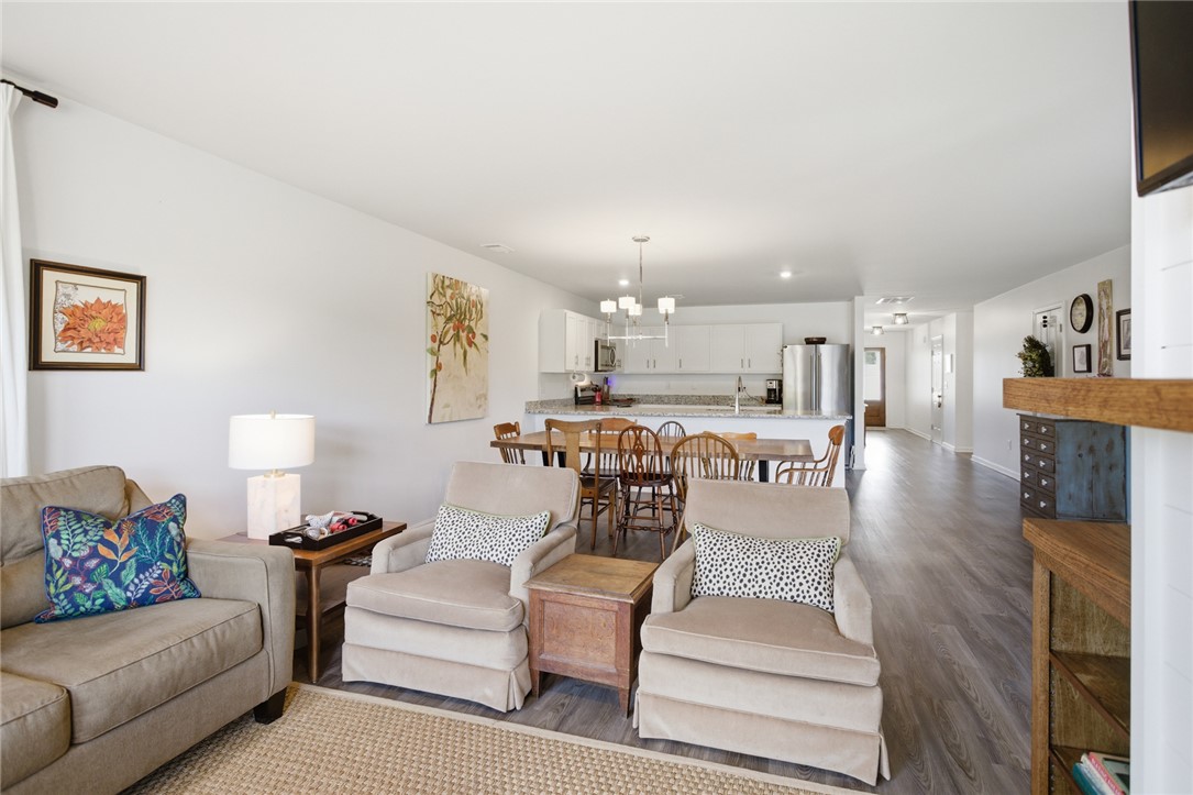 412 Chadwick Lane Walhalla, SC 29691 - Photo 7 of 37 An inviting open-concept area combines living, dining, and kitchen spaces for effortless entertaining.