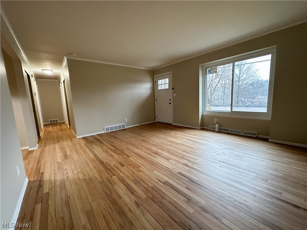615 Liberty Road Youngstown, OH 44505 - Photo 4 of 22 Living room featuring light hardwood flooring