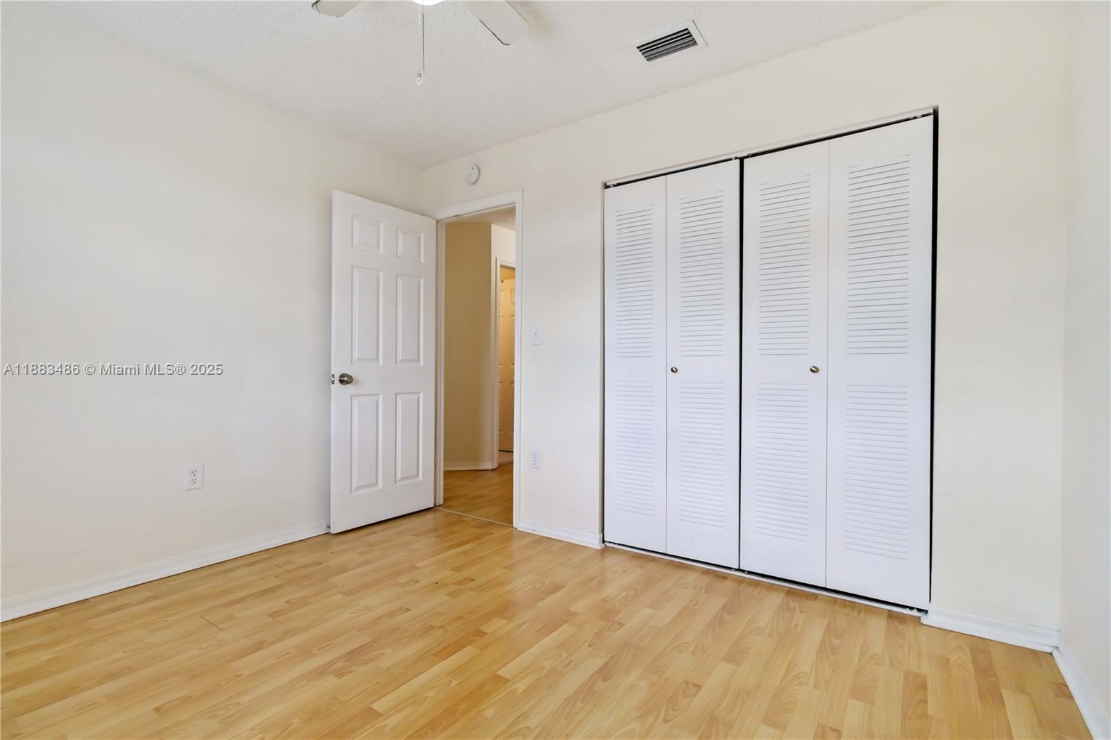 8431 Northwest 188th Terrace, Unit 8058 Hialeah, FL 33015 - Photo 21 of 34 a view of an empty room