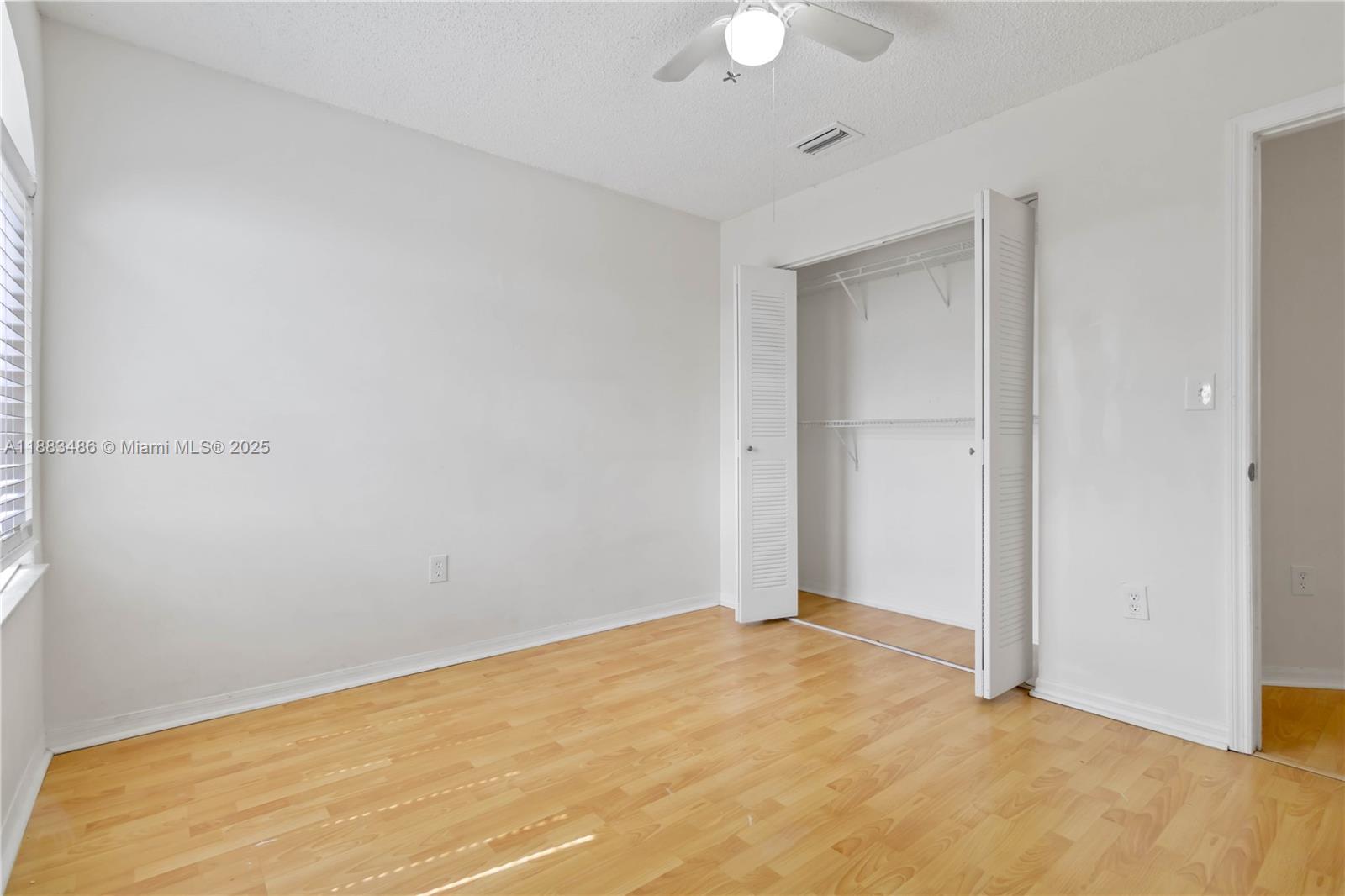 8431 Northwest 188th Terrace, Unit 8058 Hialeah, FL 33015 - Photo 23 of 34 a view of an empty room