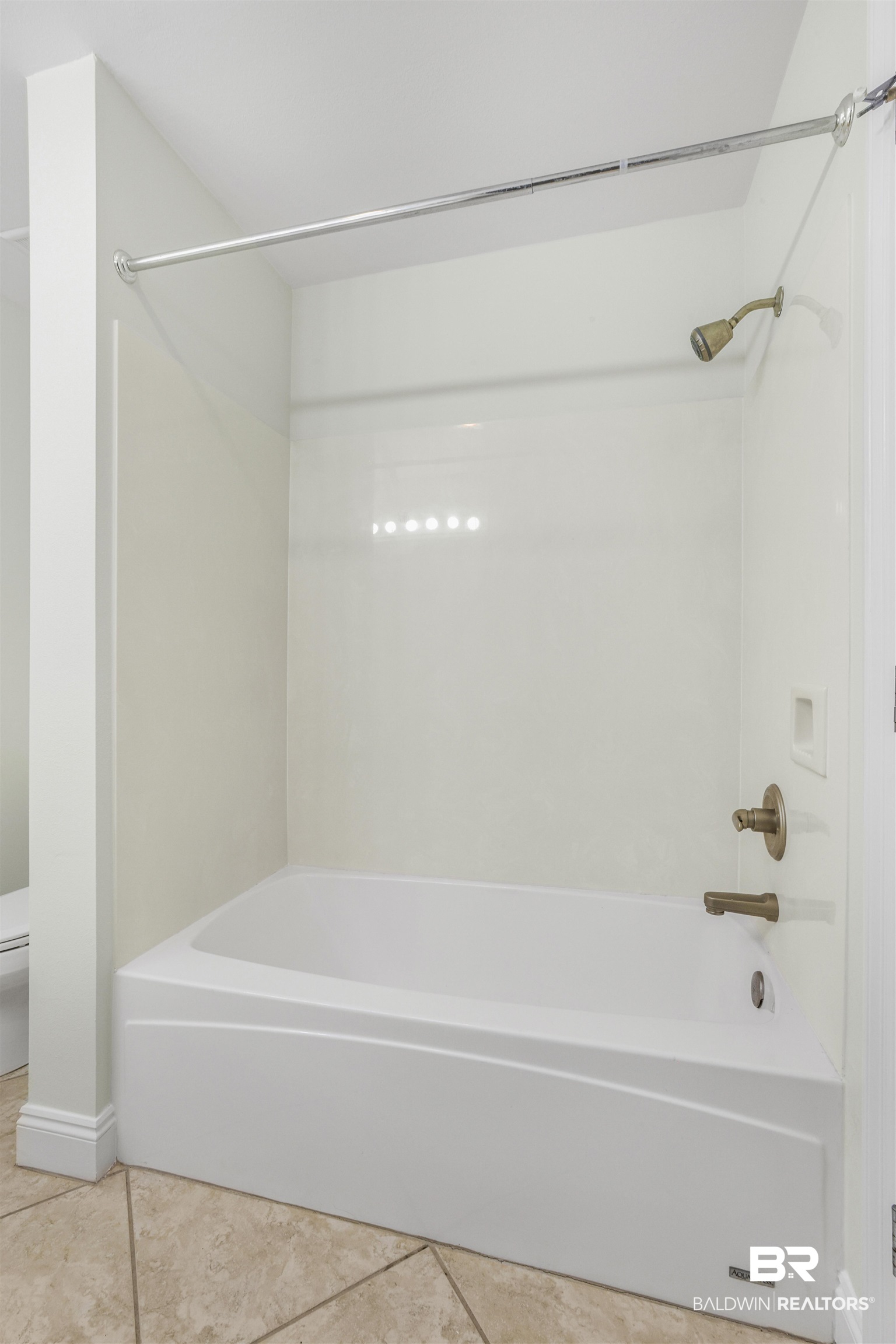 28250 Canal Road, Unit 106 Orange Beach, AL 36561 - Photo 30 of 50 Bathroom featuring shower / bath combination and light tile patterned floors