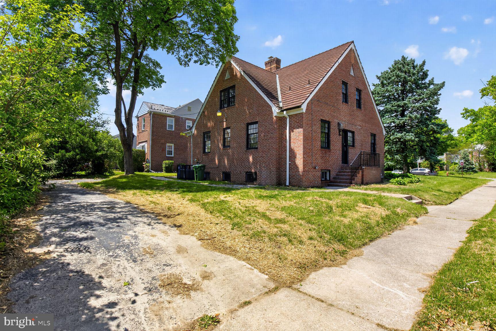 315 East Cold Spring Lane Baltimore, MD 21212 - Photo 13 of 25 a front view of house with yard and green space