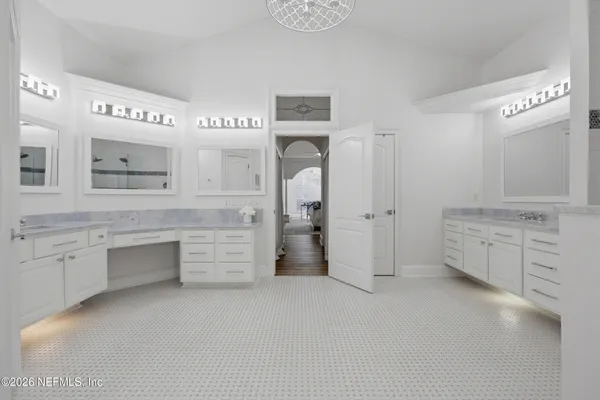 a view of a pathway with a tree