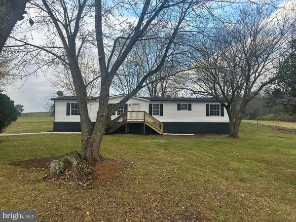 a house with trees in front of it