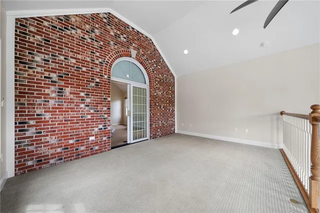 a view of empty room with windows