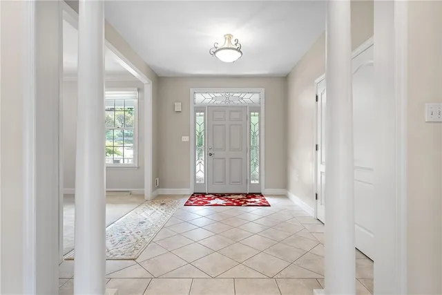 a living room with furniture and window