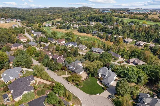 an aerial view of a city with lots of residential buildings