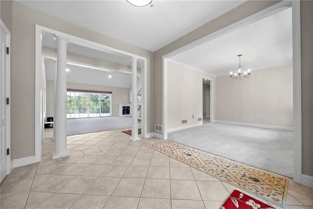 a view of an empty room and window