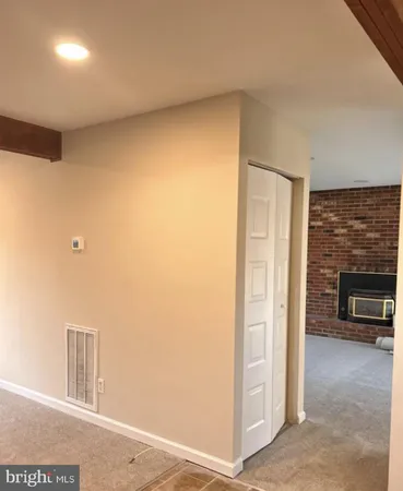 a view of livingroom with furniture and flat screen tv
