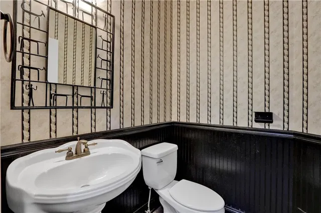 a bathroom with a sink and a toilet