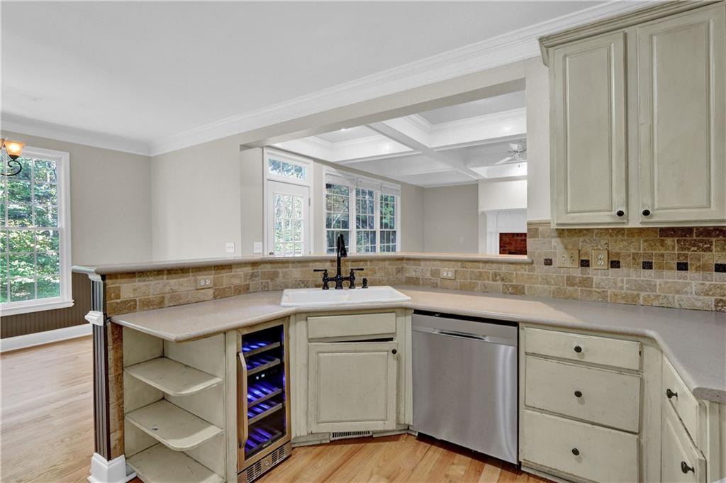 1872 Bakers Mill Road Dacula, GA 30019 - Photo 21 of 47 a kitchen with a sink stove and cabinets