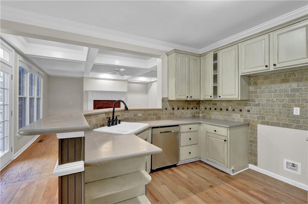 1872 Bakers Mill Road Dacula, GA 30019 - Photo 23 of 47 a kitchen with a sink cabinets and appliances