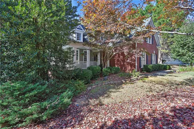 a view of a building with a tree