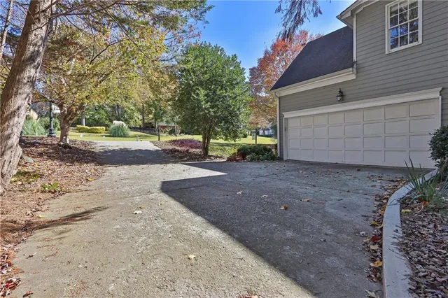 a view of a backyard of the house